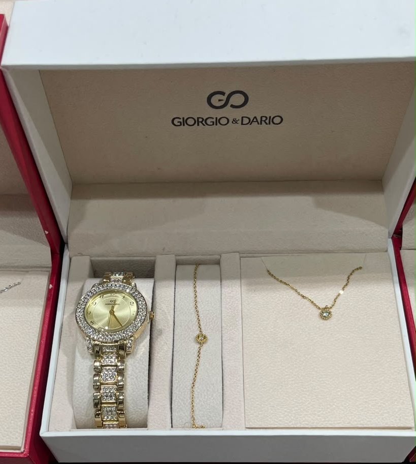 Coffret femme : montre dorée sertie, bracelet et collier